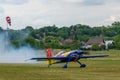 Colorful Extra EA-300 airplane model at Hangariada aeronautical festival show