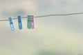 Colorful fabric clamps on wire Background blurry