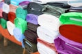 Colorful fabric rolls on textile market