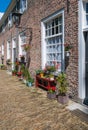 Colorful facades in a historic beguinage Royalty Free Stock Photo