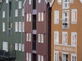 Colorful facades of houses with white windows in european Trondheim city in Norway Royalty Free Stock Photo