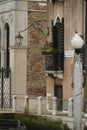 Colorful facades of old medieval and historical houses along Grand Canal in Venice, Italy. Venice is situated across a group of 11 Royalty Free Stock Photo