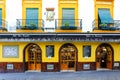 Colorful facades of old tapas restaurant in Seville