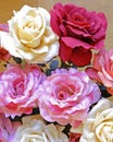 Colorful fake rose flowers top view Royalty Free Stock Photo