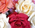 Colorful fake rose flowers top view Royalty Free Stock Photo