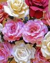 Colorful fake rose flowers top view Royalty Free Stock Photo