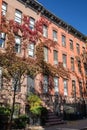 Colorful fall sidewalk scene in the Greenwich Village neighborhood of Manhattan, New York City