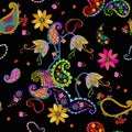 Colorful fantasy floral seamless pattern. Bright flowers with paisley leaves on black background. Festive print for fabric Royalty Free Stock Photo