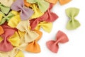 colorful farfalle pasta isolated on white background with full depth of field. Top view. Flat lay. Royalty Free Stock Photo