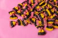 Colorful farfalle pasta on pink. Also known as bowtie or butterfly pasta Royalty Free Stock Photo