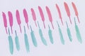 Colorful feathers, light pastel background Royalty Free Stock Photo