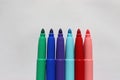 Felt-tip pens in row on a white background Royalty Free Stock Photo