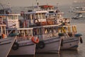 Colorful ferries near the Gateway to India