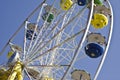 Colorful Ferris wheel in blue sky