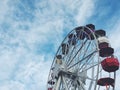 Colorful ferris wheel look up photo in amusement park