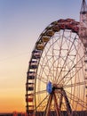 Colorful ferris whell at sunset