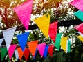 Colorful festival flags hanging in the.garden