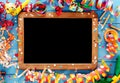 Colorful festive frame around a vintage slate