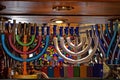 Colorful festive menorah and multi-colored jewish candlesticks on the shop window in Jerusalem, Israel