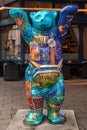 Colorful Buddy Bear, the symbol of Berlin raising his hands Royalty Free Stock Photo