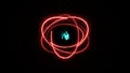 Colorful fiery atom sphere circle magic shiny rotation loop around the core on a black background Royalty Free Stock Photo