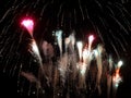 fiery sparks from huge fireworks during night celebrations