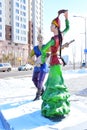 Colorful figures featuring a dancing couple in Astana