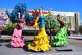 Colorful figures featuring dancing women in Astana