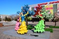Colorful figures featuring dancing women in Astana