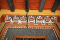 Colorful Figures Guarding Monastery Doorway, Bhutan Royalty Free Stock Photo