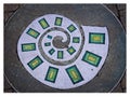 Colorful figurines decorate stoned sidewalk of downtown Austin, Texas. Royalty Free Stock Photo