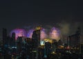 Colorful Firework with cityscape night light view of Bangkok skyline at twilight time Royalty Free Stock Photo