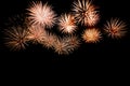 Colorful fireworks against a black night sky.Fireworks for new year. Beautiful colorful fireworks display on the urban lake for Royalty Free Stock Photo