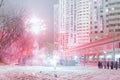 Colorful fireworks in courtyard of block of flats Royalty Free Stock Photo