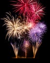 Colorful fireworks display on black