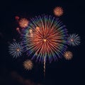 Colorful fireworks explode against a dark night sky, showcasing a dynamic display of Royalty Free Stock Photo