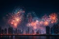 Colorful fireworks exploding over a modern city skyline at night, vibrant celebration mood Royalty Free Stock Photo