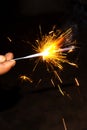 Bright sparkler candle burning for Christmas or new year Festival celebration isolated on black background Royalty Free Stock Photo