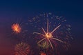 Colorful fireworks on night sky background. Royalty Free Stock Photo