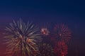 Colorful fireworks on night sky background. Royalty Free Stock Photo