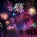 Colorful fireworks and palm tree silhouettes on night sky background Royalty Free Stock Photo