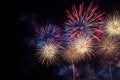 Colorful fireworks soaring over a black background. Can be used as abstract background or wallpaper Royalty Free Stock Photo