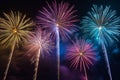 Colorful fireworks soaring over a black background. Can be used as abstract background or wallpaper Royalty Free Stock Photo