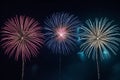 Colorful fireworks soaring over a black background. Can be used as abstract background or wallpaper Royalty Free Stock Photo