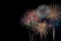 Colorful fireworks soaring over a black background. Can be used as abstract background or wallpaper Royalty Free Stock Photo