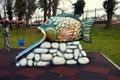 Colorful fish slider in Zavoi Park from Ramnicu Valcea