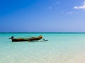 Colorful fishermen pirogue moored on turquoise sea of Nosy Ve island, Indian Ocean, Madagascar