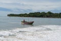 Colorful fishing boat beaching on a sri lankan beach, Arugam bay, Sri lanka