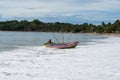 Colorful fishing boat beaching on a sri lankan beach, Arugam bay, Sri lanka