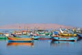 Colorful fishing boats anchored in Paracas Bay, Peru